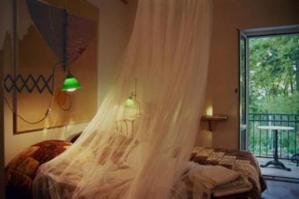 Schlafzimmer mit Balkon